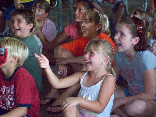 audience enjoying inflatable party place magic